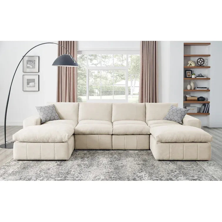 Anchoretta 134" Wide Reversible Modular Sectional with Ottoman